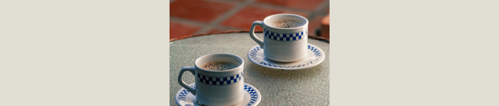coffee cups light and dark roast on table