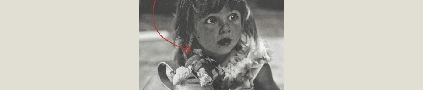 girl eating fudge sundae
