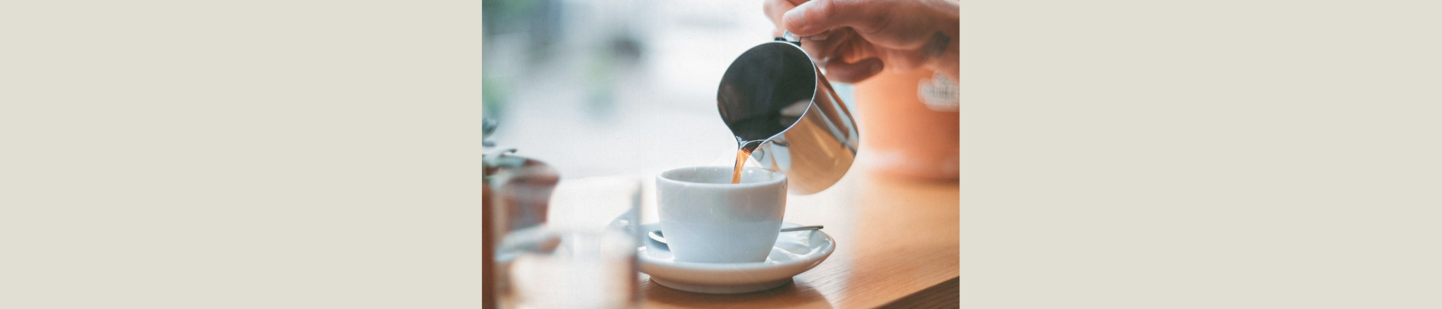 coffee being poured into mug