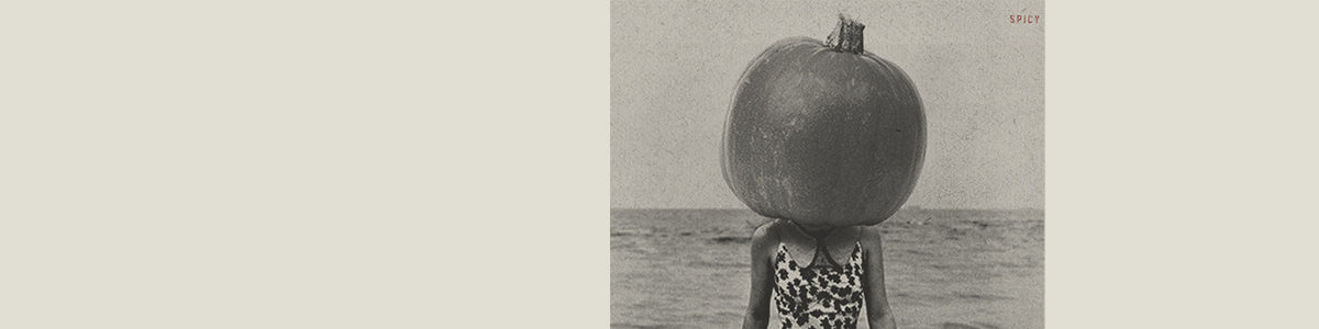 pumpkin on a woman's head
