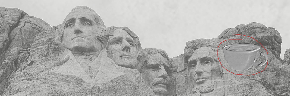 Mount Rushmore with latte carved in